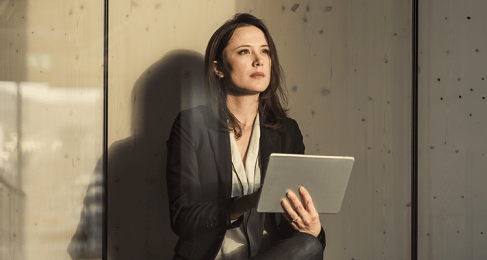 Woman holding laptop